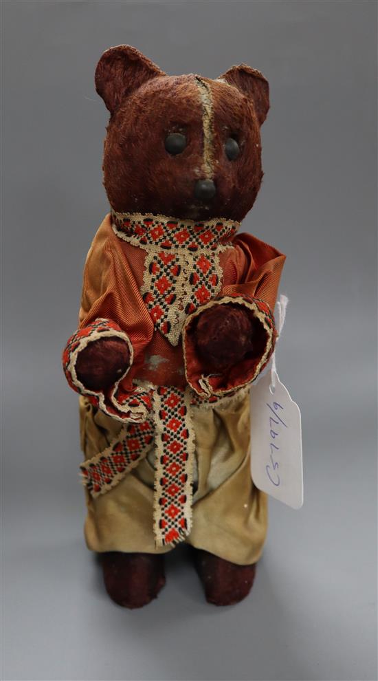 A clockwork dancing bear height 22cm